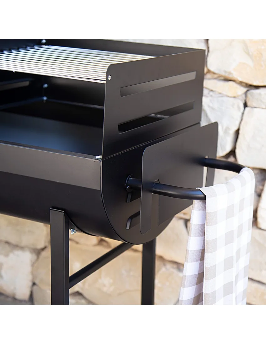 Barbacoa de carbón Aktive con doble parrilla y asa 97 cm: detalle del asa de transporte con protección