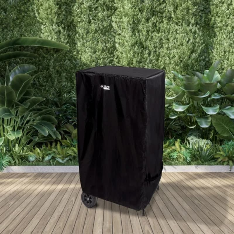 Funda para barbacoa impermeable Aktive 74,5x64,5x109 cm: puesta sobre la barbacoa en el jardín
